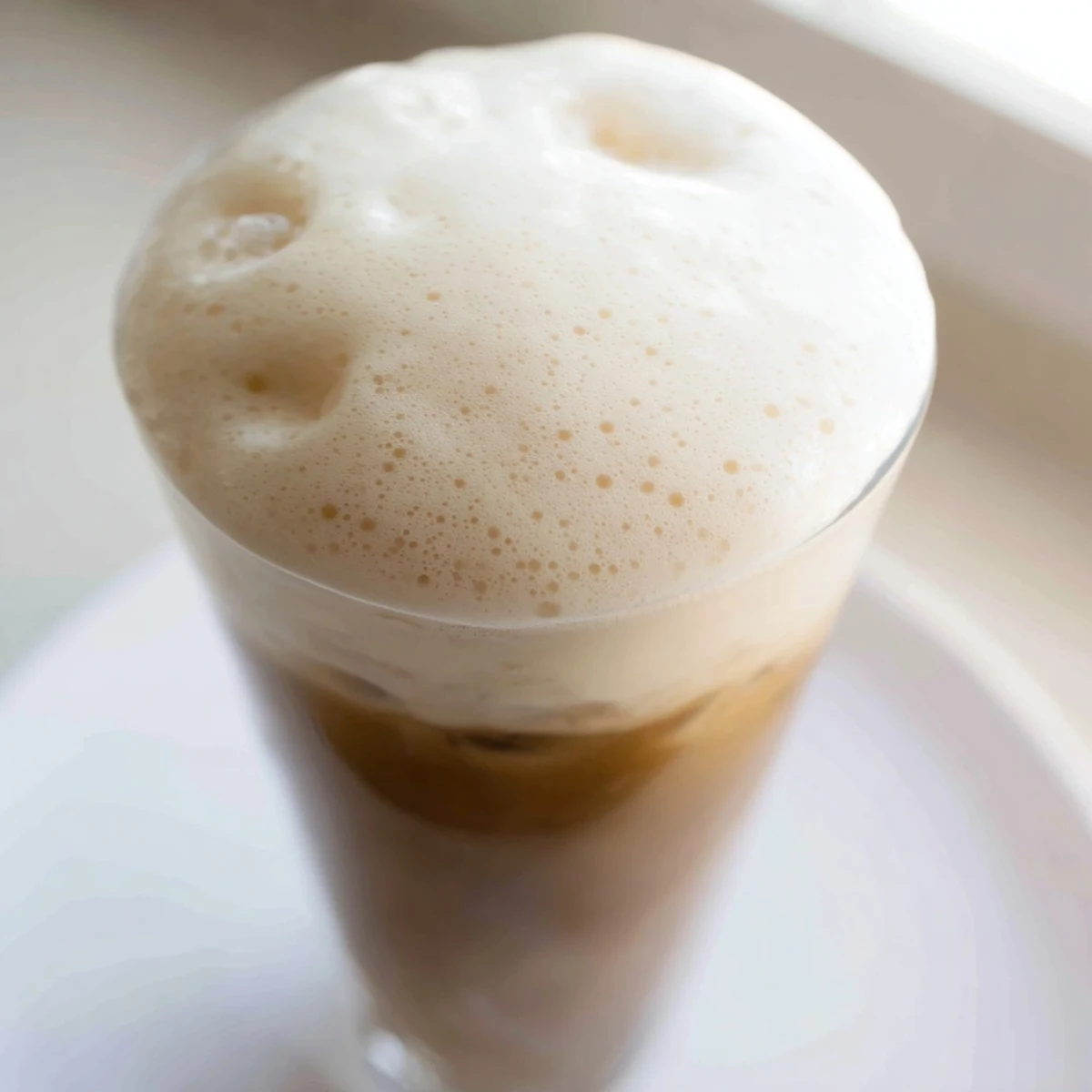 Starbucks cold foam copycat recipe: a fluffy, vanilla-infused topping ready to dollop on cooling coffee drinks.