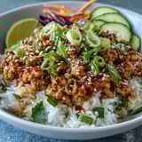 Fluffy rice topped with tender turkey, fresh carrots and cucumbers, finished with sesame seeds and tangy bang bang sauce.