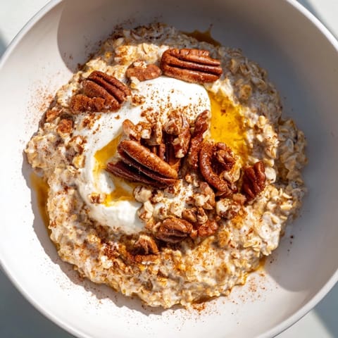 This comforting breakfast features pumpkin spice latte oats, ready to brighten your morning.