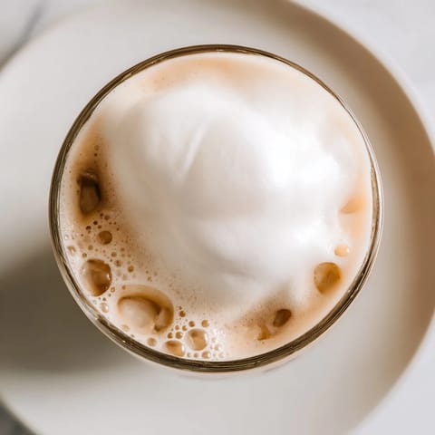 Homemade Starbucks cold foam copycat, a frothy delight, perfect for elevating your favorite coffee beverages.
