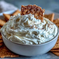 Creamy, dreamy cheesecake dip with graham crackers, perfect for easy dessert dipping.  